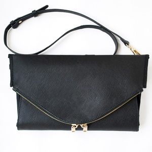 Nest Designs - genuine leather diaper clutch